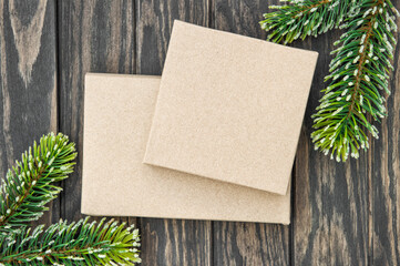 Christmas gift boxes craft paper wrapping wooden background