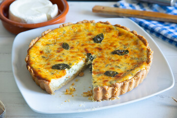 Flaó traditional dessert from Ibiza. The cheesecake is a unique combination of flavors — anise and mint.  The filling is made from fresh cheese (or ricotta and mascarpone), eggs and chopped mint.