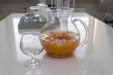 Refreshing freshly squeezed orange juice filled in glass and carafe