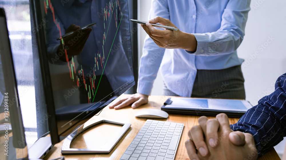 Aufkleber broker showing some ascending to his colleague planning and analyzing graph stock market trading wit