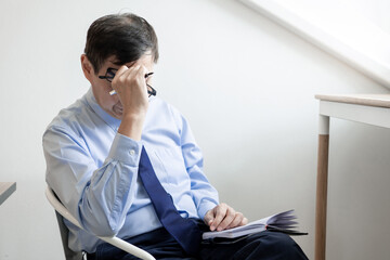 frustrated stressed senior businessman feeling fatigue and headache, Negative emotion facial...