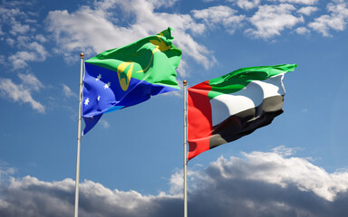 Beautiful national state flags of UAE United Arab Emirates and Christmas Island together at the sky background. 3D artwork concept.