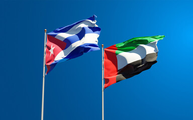 Beautiful national state flags of UAE United Arab Emirates and Cuba together at the sky background. 3D artwork concept.