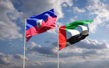 Beautiful national state flags of Haiti and UAE United Arab Emirates together at the sky background. 3D artwork concept.