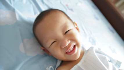 Young Boy is smiling & Positive while in Hospital Bed During Pandemic