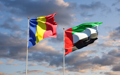 Beautiful national state flags of Romania and UAE United Arab Emirates together at the sky background. 3D artwork concept.