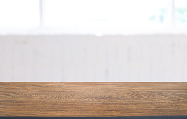 Empty wooden table in front of abstract blurred background of coffee shop . can be used for display or montage your products.Mock up for display of product