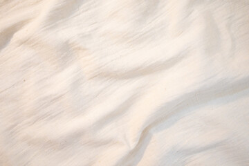 Fototapeta premium Fabric backdrop White linen canvas crumpled natural cotton fabric Natural handmade linen top view background Organic Eco textiles White Fabric texture