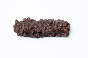 Delicious tasty nuts and milk chocolate bar isolated on white background