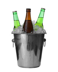 Metal bucket with bottles of beer and ice cubes isolated on white