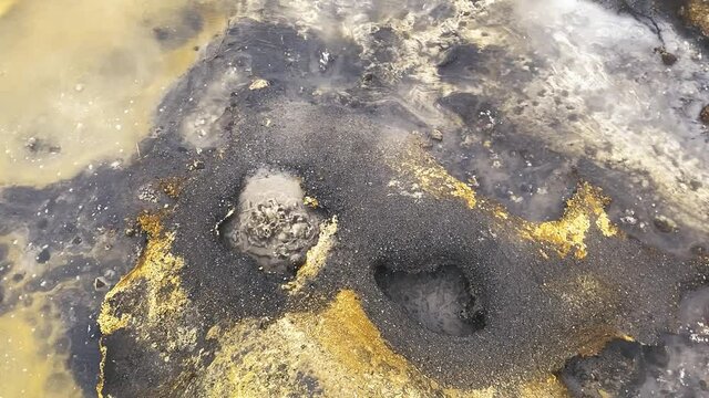 Geothermal activity boiling hot water geyser and fumaroles, Kamchatka, Russia