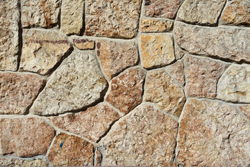 Steinmauer, rötlich, beige