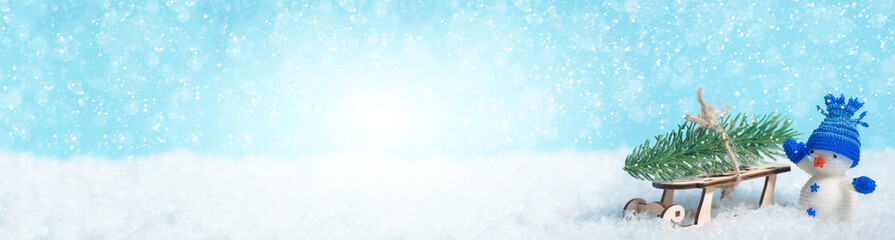 Christmas banner background with snowflakes and snowman delivering xmas tree