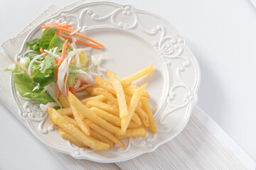 Tasteful roasted turkey steak with chips and vegetable