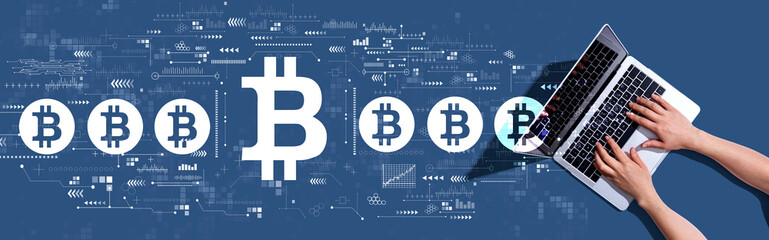 Bitcoin theme with woman using a laptop computer