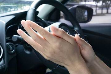 wash hand by alcohol gel sanitizer before driving car