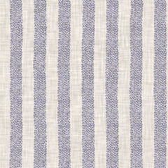 Coastal blue stitched stripe on tan linen texture background. Irregular hand drawn diagonal line...