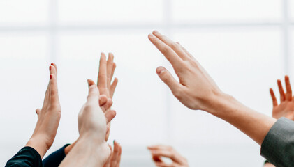 business team giving each other a high five
