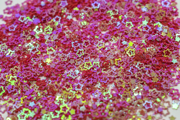 background that consists of red and gold shiny stars. holiday background