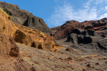 Azores, Graciosa Island, colourful volcanic rock layers in the bay of Porto Afonso.