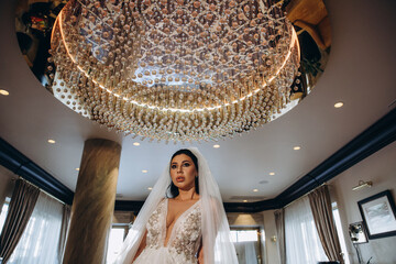 A bride in a white dress prepares to meet the groom. Morning of the bride. The path to the meeting...