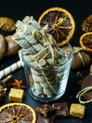 Christmas sweets on a black background close-up