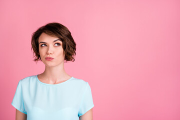 Obraz premium Photo of cute dreamy woman wear casual blue t-shirt look empty space isolated pink color background