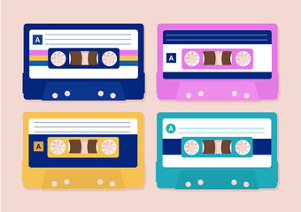 Vector cassettes - a set of four cassette tapes in different colour. Retro music, and 80s nostalgia concept. Vector illustration.