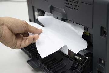 Technicians Removing Paper Stuck, Paper Jam In Printer At Office