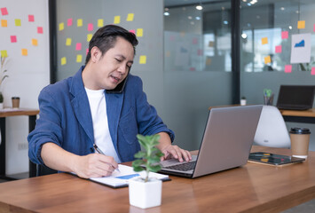 The executives of the company sit on the desks in the office. He is the leader in startup. Boss of new company. Businessman growth launch concept