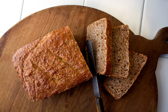 Overhead View Of Cracked Wheat Bread On Cutting Board