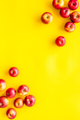 Frame of red apples on kitchen table top view