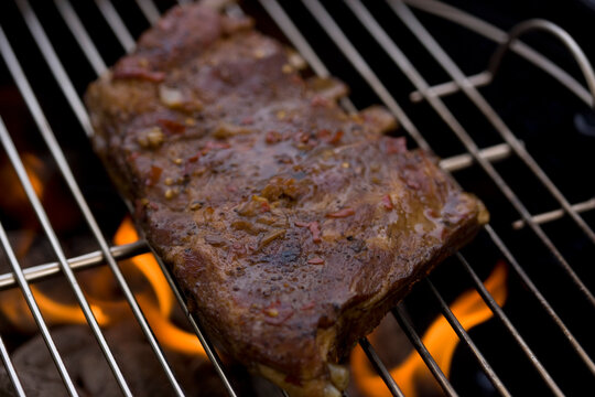 Close Up Of Pork Ribs On Grill