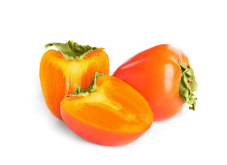 Delicious cut and whole fresh ripe persimmons isolated on white