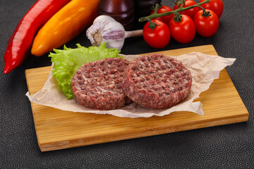 Raw burger cutlet