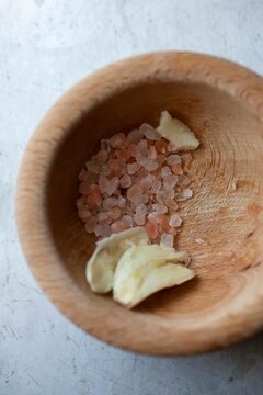 Close up of salt and garlic in mortar