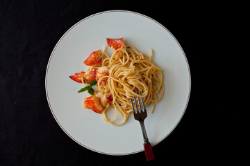 Close up of lobster pasta with mint