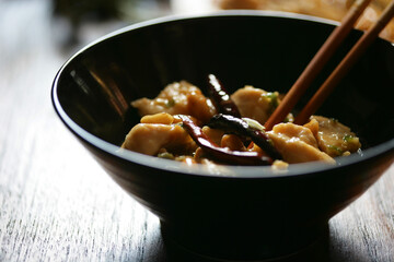 Asian meal with meat and vegetables in bowl