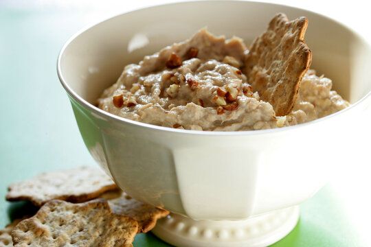 Close up of bowl with dip and crackers