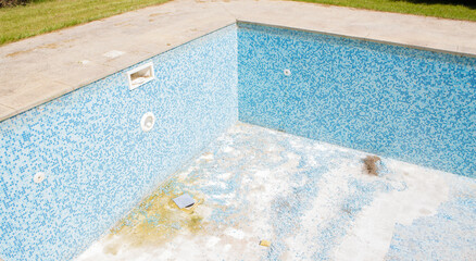 construction work on an old swimming pool
