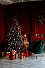 Beautiful festively decorated room with a Christmas tree. Cozy living room in red tones with a stylish classic decor.