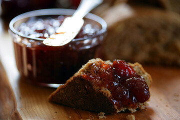 Close up of whole wheat bread with plum jam