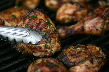 Close up of grilled chicken on grill