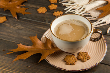 Cup of hot coffee Christmas sweet cookies plaid with leaves