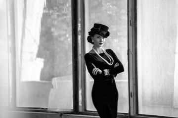 Beautiful woman as Coco Chanel - obrazy, fototapety, plakaty