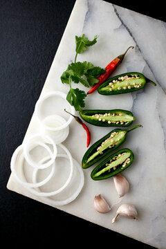 Close up of spicy ingredients on cutting board
