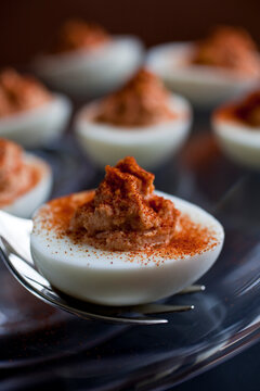 Close up of smoky red devil egg
