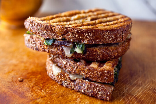 Close up of greens and mushroom panini