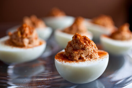 Close up of smoky red devil eggs
