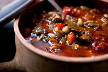 Spanish style lamb stew in pot